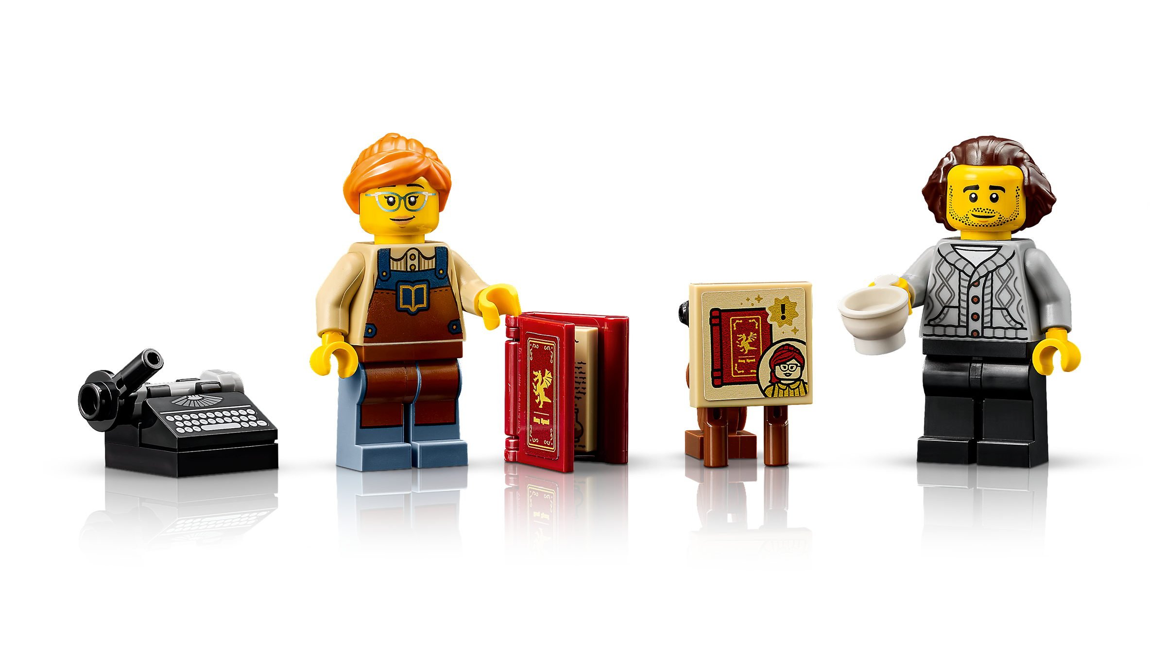 Les deux minifigurines d'auteur et de lecteur livrées avec le set LEGO 11379