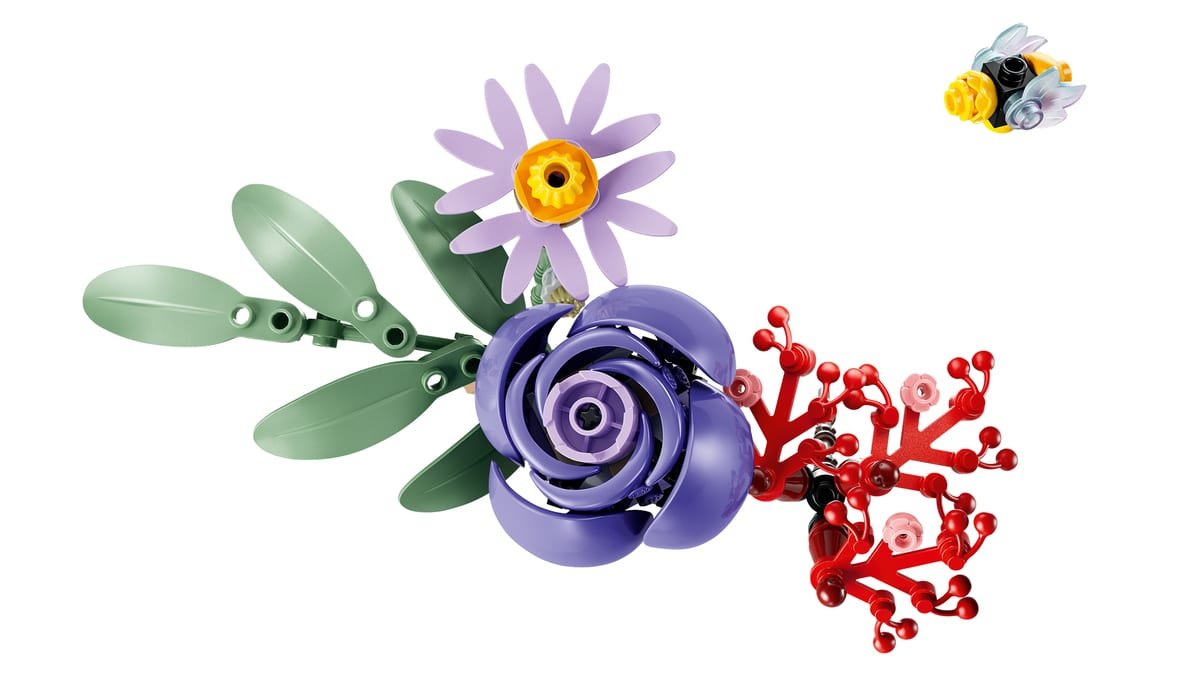 Detail des fleurs aux petales en forme de guitare, avec l'abeille