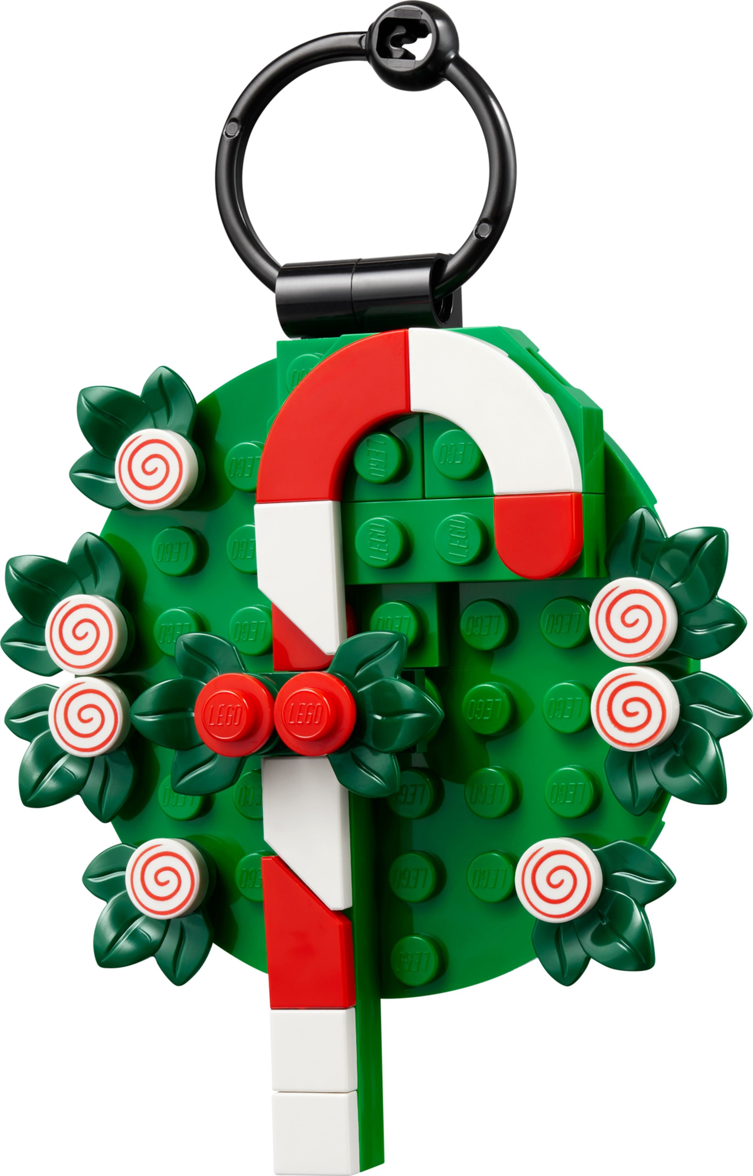 La couronne de houx traversée par une canne de bonbon