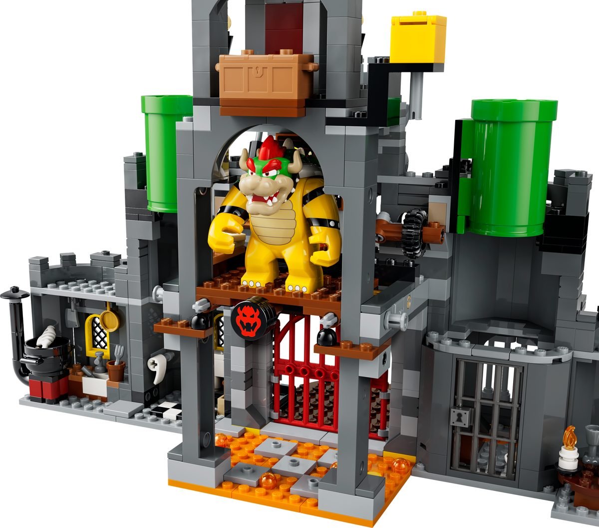 L'intérieur du château du set 72060 : Bowser sur sa plateforme au-dessus de la grille rouge, cuisine et cachot de part et d'autre