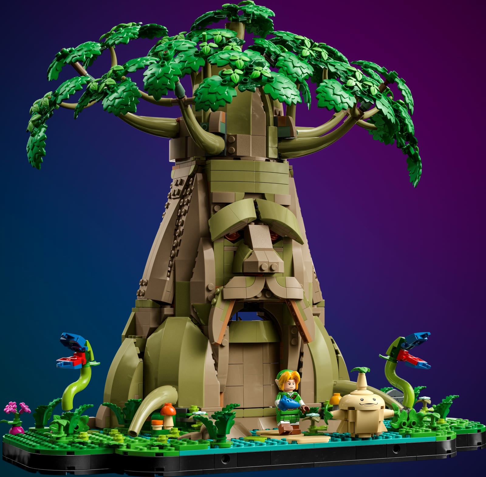 Le Vénérable Arbre Mojo LEGO 77092 en version Ocarina of Time, feuillage vert et bouche ouverte à la base, sur fond holographique